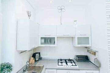 Фото номера Роскошный четырехместный номер Гостевой дом Apartments in Uzhgorod г. Ужгород 7