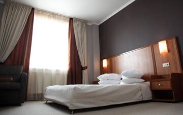 Фото номера Двухместный номер бизнес-класса с 1 кроватью Отель Hotel Praha г. Ужгород 4