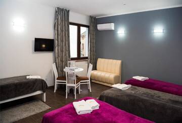 Фото номера Четырехместный номер Отель Hotel " BOUTIQUE " г. Ужгород 5