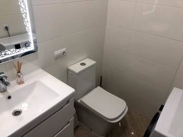 Фото номера Апартаменты с 1 спальней Апартаменты GIL Apartment on Tobilevicha, new г. Ужгород 12